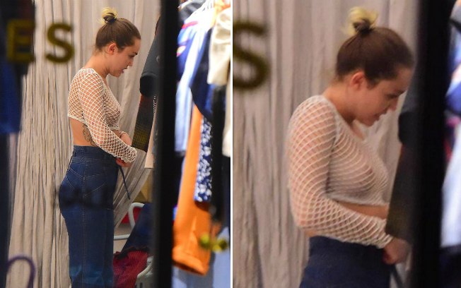 Miley Cyrus fica com seios à mostra durante as compras