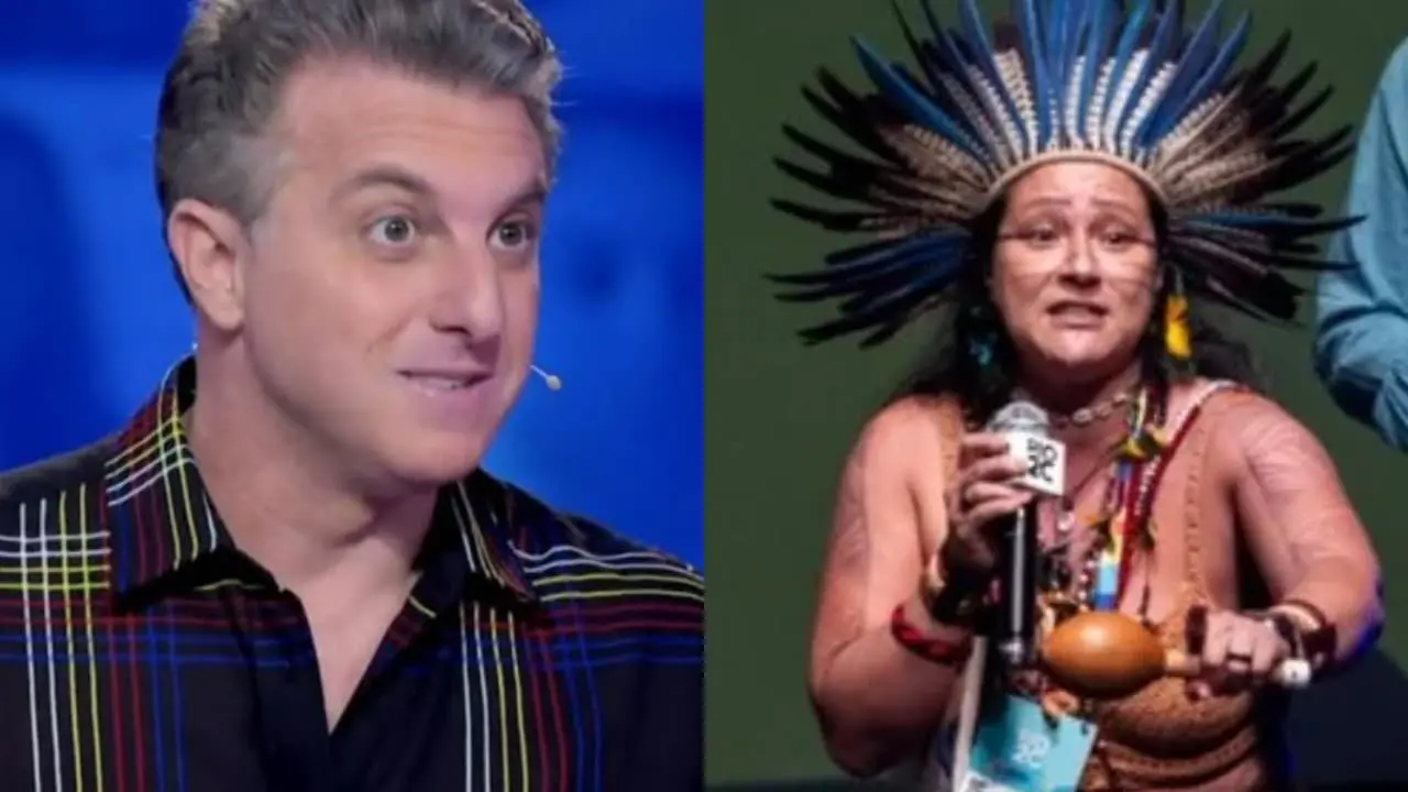 Mulher invade palco, pega Luciano Huck de surpresa e faz apelo