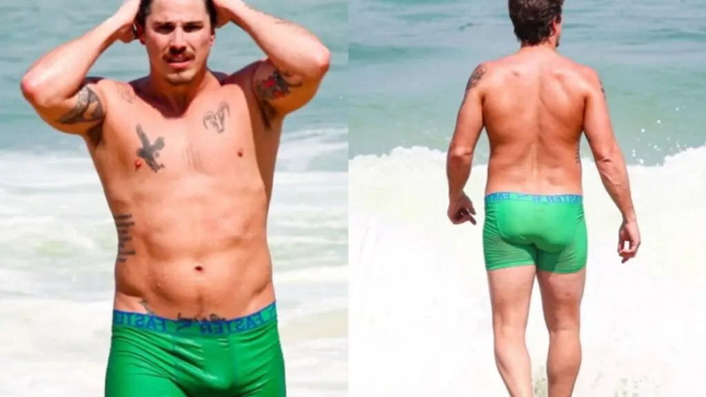 Romulo Arantes Neto é flagrado de cueca justa na praia e “volume” decepciona fãs; confira!